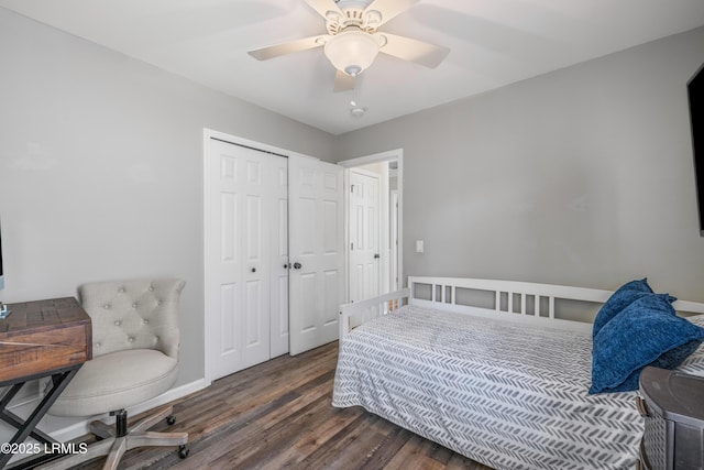 bedroom with baseboards, a closet, a ceiling fan, and wood finished floors