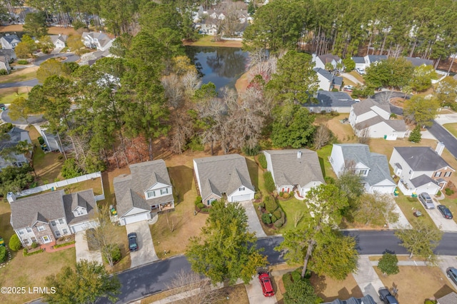 aerial view featuring a water view and a residential view