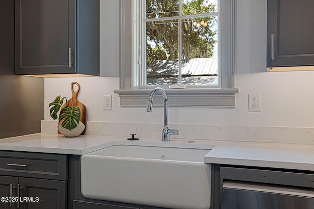 1411 Duke St, Beaufort, SC 29902 - kitchen featuring dishwasher, gray cabinetry, and light stone countertops