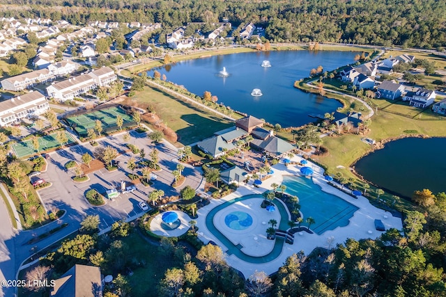 bird's eye view with a water view