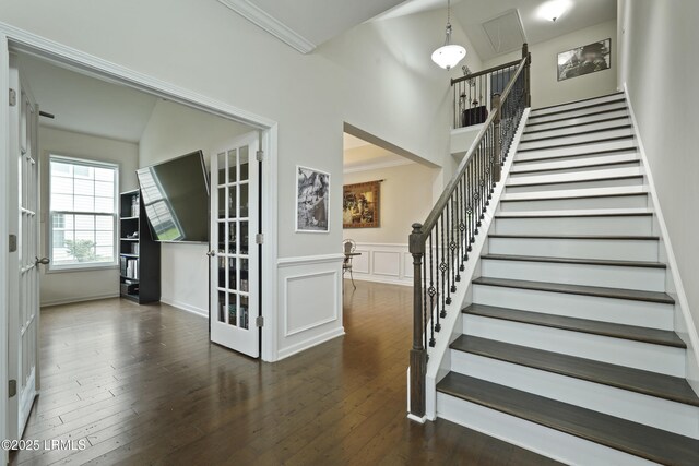 36 Hopper Ridge Rd, Okatie, SC 29909 - stairs featuring hardwood / wood-style floors, crown molding, french doors, and baseboards