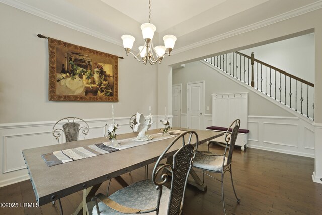 36 Hopper Ridge Rd, Okatie, SC 29909 - dining room featuring a chandelier, a decorative wall, dark wood-style floors, stairs, and ornamental molding