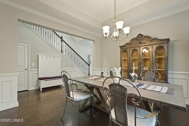 36 Hopper Ridge Rd, Okatie, SC 29909 - dining space with a chandelier, wainscoting, dark wood-style floors, stairway, and ornamental molding