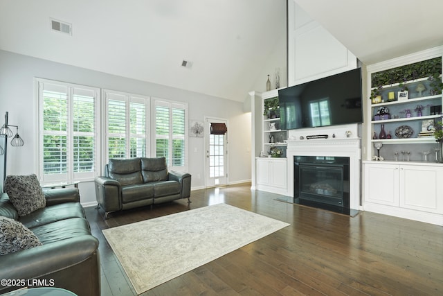 36 Hopper Ridge Rd, Okatie, SC 29909 - living room with hardwood / wood-style flooring, high vaulted ceiling, baseboards, and a fireplace with flush hearth