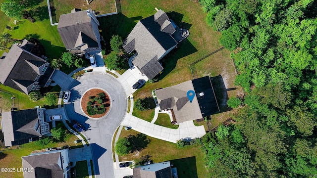 birds eye view of property with a residential view