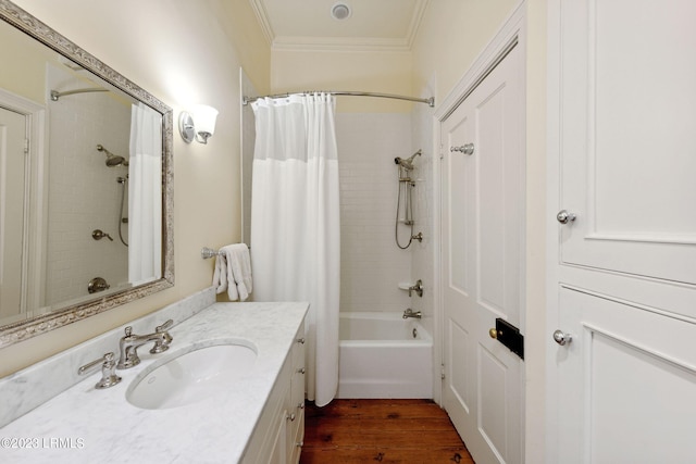 bathroom featuring shower / tub combo with curtain, vanity, crown molding, and hardwood / wood-style flooring