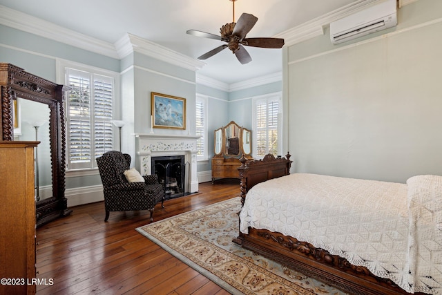 bedroom featuring ornamental molding, an AC wall unit, dark hardwood / wood-style floors, and ceiling fan