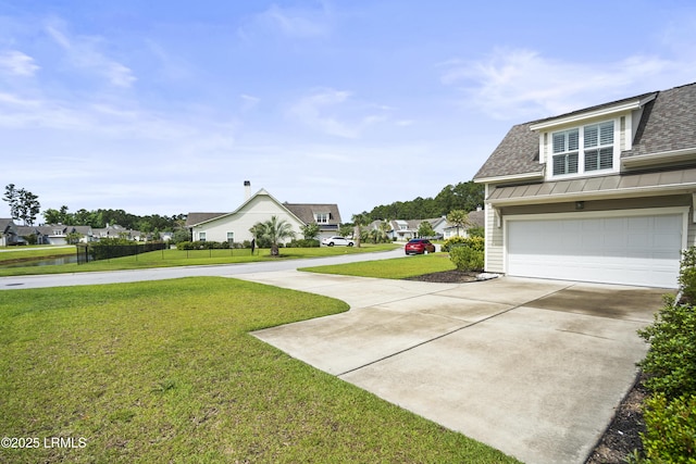 135 Danbridge Ct, Bluffton, SC 29910 - view of green lawn with a residential view and driveway