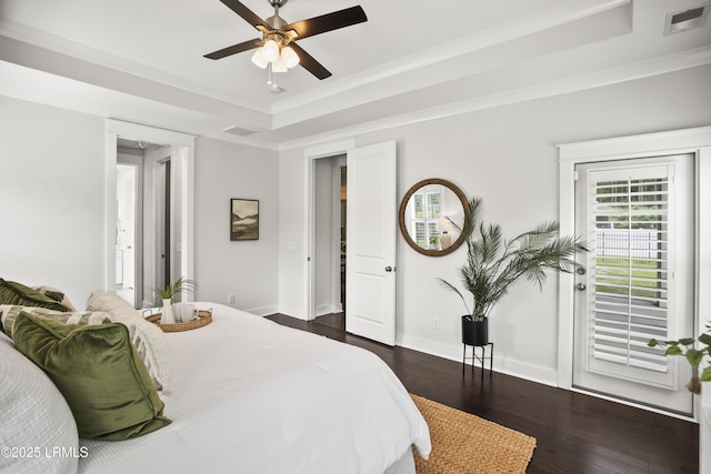 135 Danbridge Ct, Bluffton, SC 29910 - bedroom with dark wood-type flooring, ornamental molding, a raised ceiling, and ceiling fan
