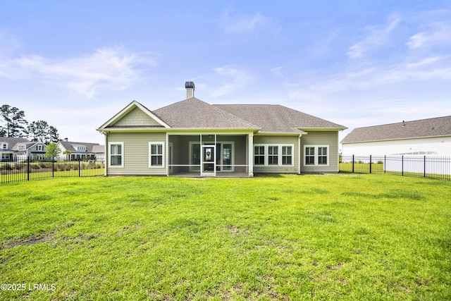 135 Danbridge Ct, Bluffton, SC 29910 - rear view of property with a sunroom, a chimney, a fenced backyard, and a shingled roof