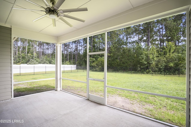 135 Danbridge Ct, Bluffton, SC 29910 - unfurnished sunroom featuring ceiling fan and view of wooded area