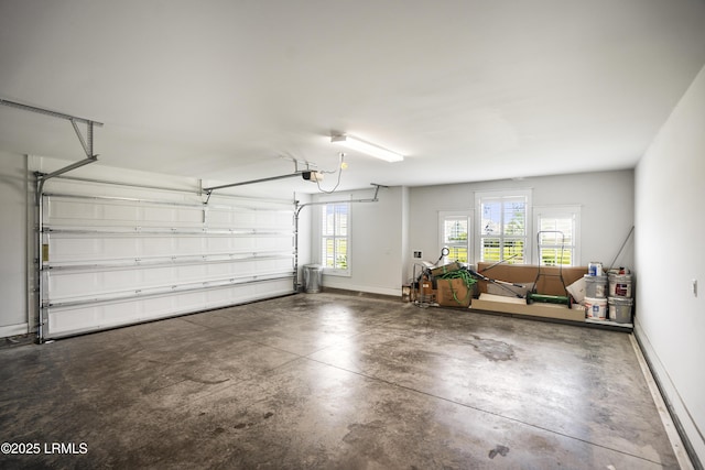 135 Danbridge Ct, Bluffton, SC 29910 - garage with baseboards and a garage door opener
