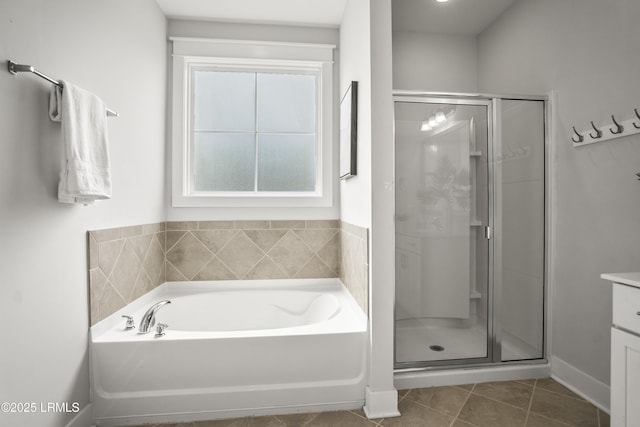 135 Danbridge Ct, Bluffton, SC 29910 - full bath with a garden tub, tile patterned flooring, a shower stall, and vanity