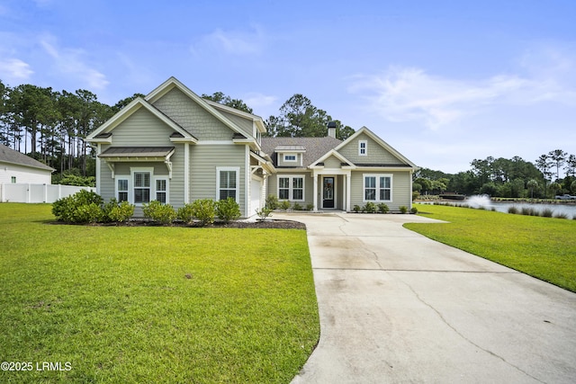 135 Danbridge Ct, Bluffton, SC 29910 - craftsman house featuring concrete driveway, a water view, and a chimney
