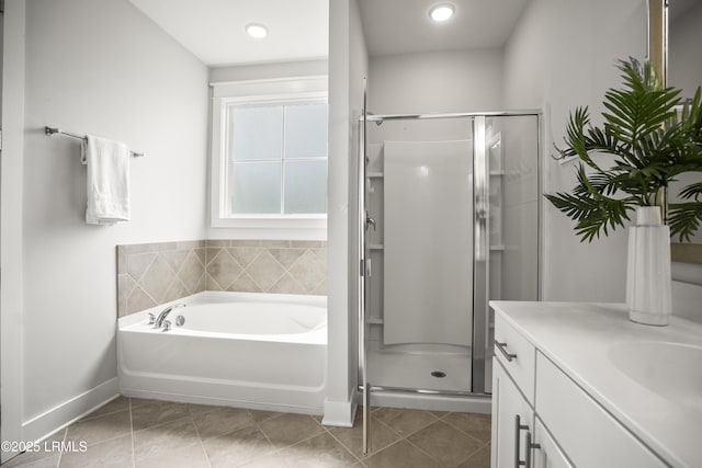 135 Danbridge Ct, Bluffton, SC 29910 - full bath with a stall shower, a bath, vanity, tile patterned floors, and recessed lighting