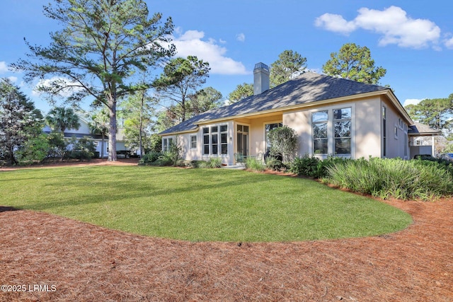 view of front of house with a front yard