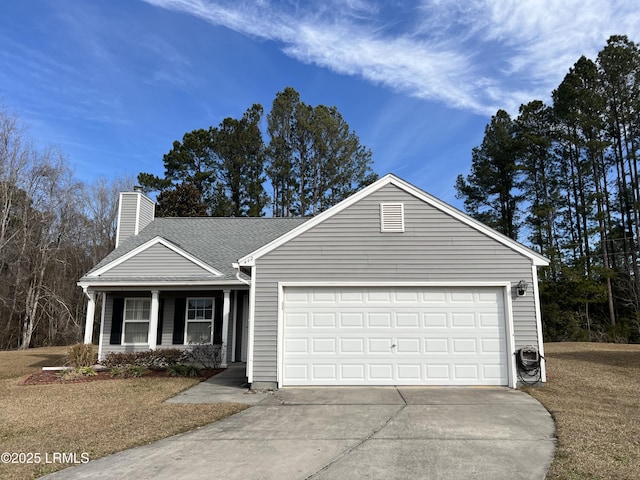 ranch-style house featuring a garage, a front lawn, and covered porch