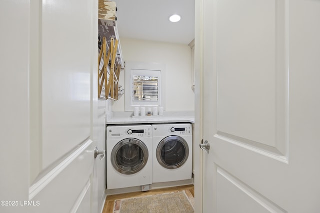 625 Spanish Wells Rd Unit 12, Hilton Head Island, SC 29926 - laundry area featuring recessed lighting, separate washer and dryer, laundry area, and light wood finished floors