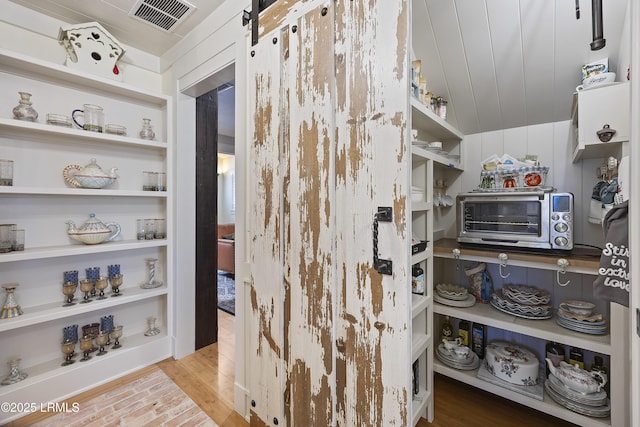 625 Spanish Wells Rd Unit 12, Hilton Head Island, SC 29926 - pantry featuring visible vents and a toaster