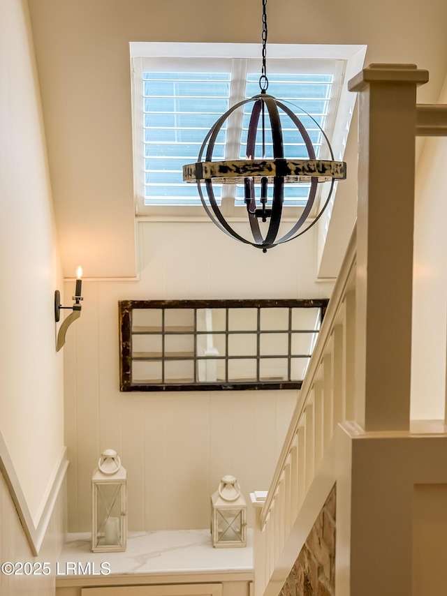 625 Spanish Wells Rd Unit 12, Hilton Head Island, SC 29926 - staircase with a decorative wall