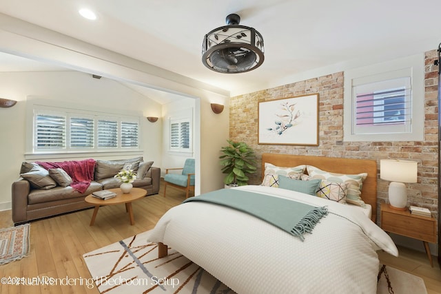 625 Spanish Wells Rd Unit 12, Hilton Head Island, SC 29926 - bedroom with wood finished floors and vaulted ceiling
