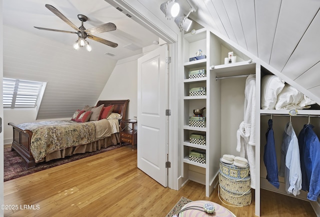 625 Spanish Wells Rd Unit 12, Hilton Head Island, SC 29926 - bedroom featuring visible vents, a ceiling fan, light wood finished floors, and vaulted ceiling