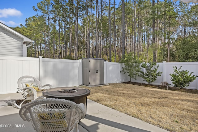 view of patio / terrace featuring a fire pit