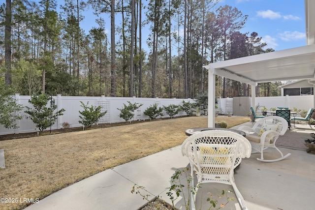 view of patio / terrace featuring a storage shed