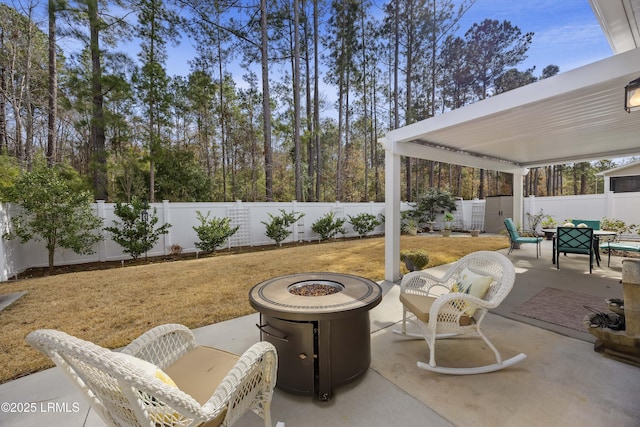 view of patio / terrace with a fire pit