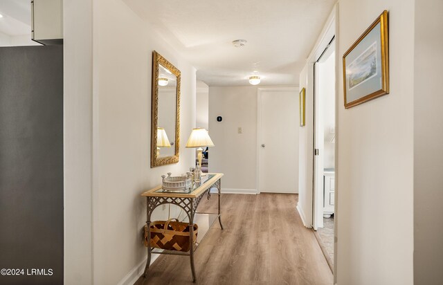 corridor featuring light hardwood / wood-style flooring