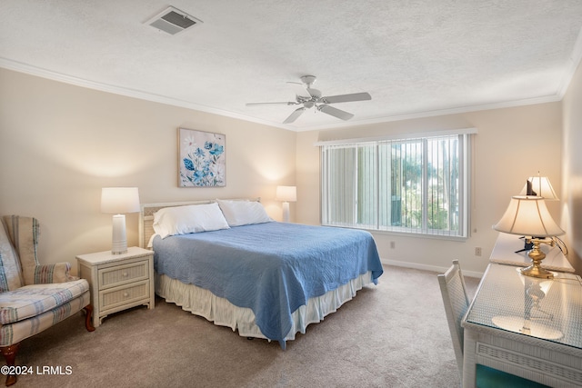 bedroom featuring crown molding, ceiling fan, carpet flooring, and a textured ceiling