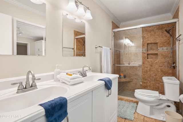 bathroom featuring tile patterned flooring, vanity, ornamental molding, and a shower with shower door