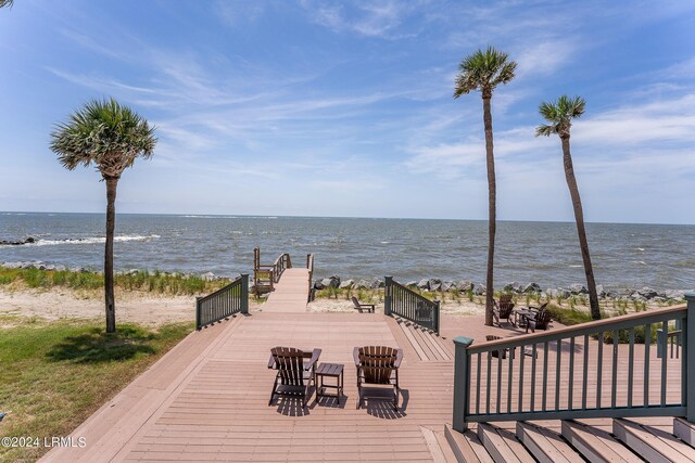 wooden terrace with a water view