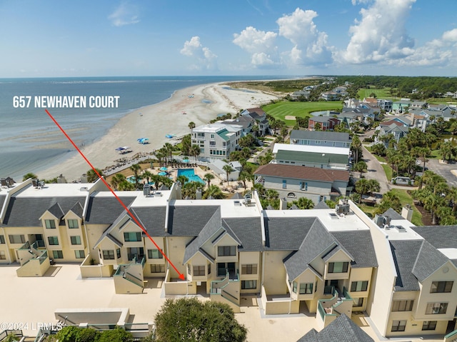 bird's eye view with a view of the beach and a water view