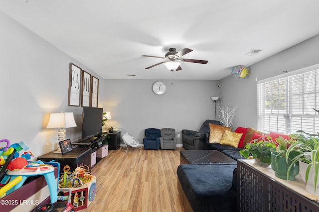 76 Shadow Moss Dr, Beaufort, SC 29906 - living area featuring light wood finished floors, visible vents, and a ceiling fan