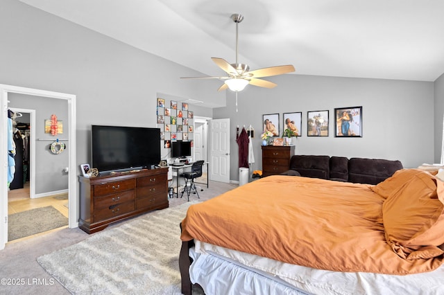 76 Shadow Moss Dr, Beaufort, SC 29906 - bedroom with a ceiling fan, high vaulted ceiling, a walk in closet, baseboards, and light carpet