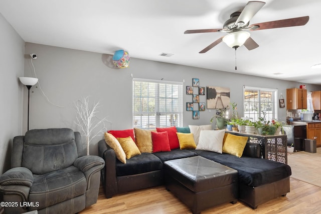76 Shadow Moss Dr, Beaufort, SC 29906 - living room with light wood finished floors, visible vents, and ceiling fan