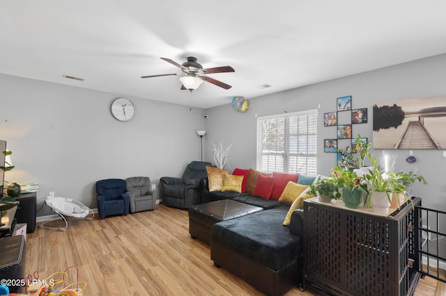 76 Shadow Moss Dr, Beaufort, SC 29906 - living area with baseboards, light wood finished floors, ceiling fan, and visible vents