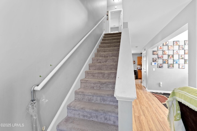 76 Shadow Moss Dr, Beaufort, SC 29906 - stairway featuring wood finished floors and baseboards