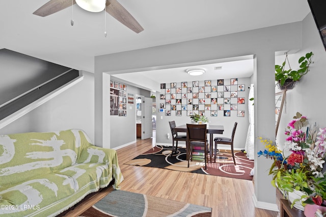 76 Shadow Moss Dr, Beaufort, SC 29906 - living area with wood finished floors, baseboards, and ceiling fan