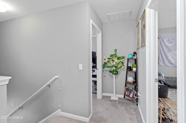 76 Shadow Moss Dr, Beaufort, SC 29906 - corridor with visible vents, an upstairs landing, baseboards, and carpet floors