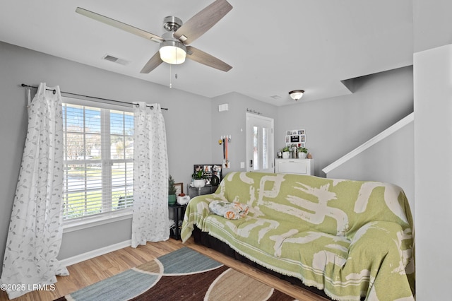 76 Shadow Moss Dr, Beaufort, SC 29906 - bedroom with baseboards, ceiling fan, visible vents, and wood finished floors