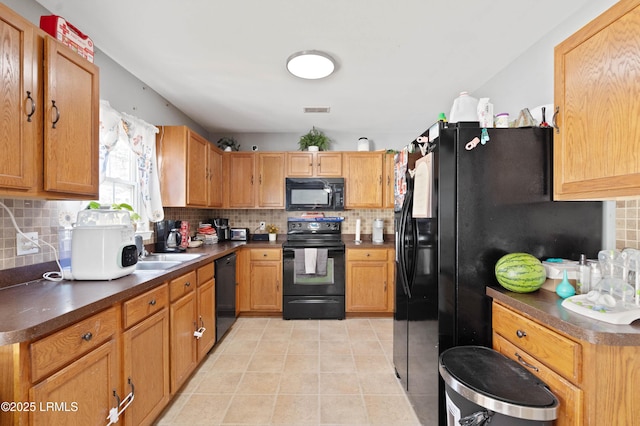 76 Shadow Moss Dr, Beaufort, SC 29906 - kitchen featuring light tile patterned floors, visible vents, tasteful backsplash, and black appliances