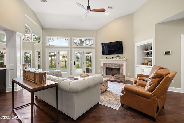 8 Wild Magnolia Ln, Okatie, SC 29909 - living area featuring ceiling fan, a fireplace, dark wood finished floors, visible vents, and a healthy amount of sunlight