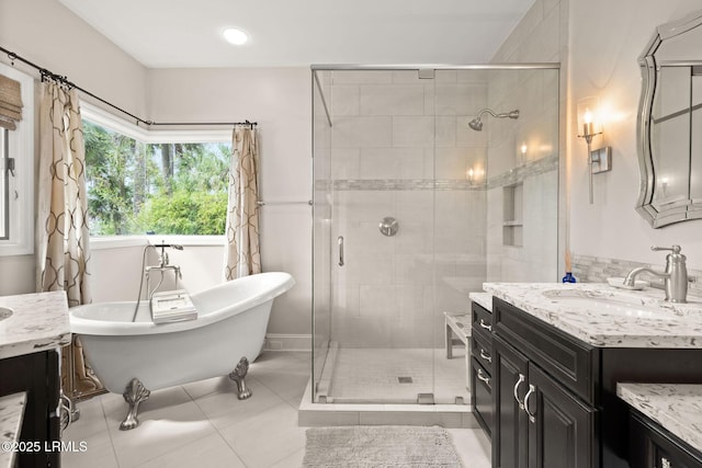 8 Wild Magnolia Ln, Okatie, SC 29909 - full bathroom with a shower stall, tile patterned floors, vanity, and a freestanding bath