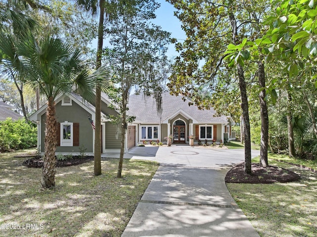 8 Wild Magnolia Ln, Okatie, SC 29909 - view of front facade featuring roof with shingles, french doors, and stucco siding