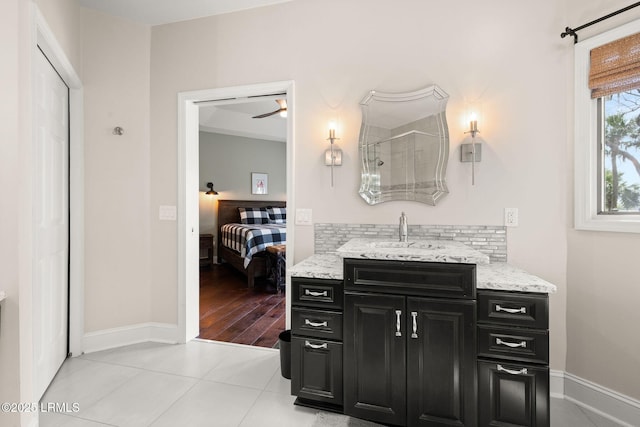 8 Wild Magnolia Ln, Okatie, SC 29909 - bathroom featuring vanity, baseboards, tile patterned floors, ensuite bath, and walk in shower