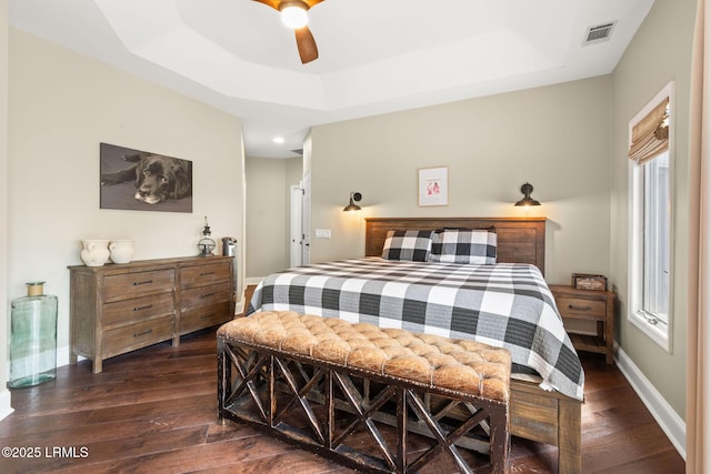 8 Wild Magnolia Ln, Okatie, SC 29909 - bedroom with visible vents, baseboards, a raised ceiling, ceiling fan, and wood-type flooring