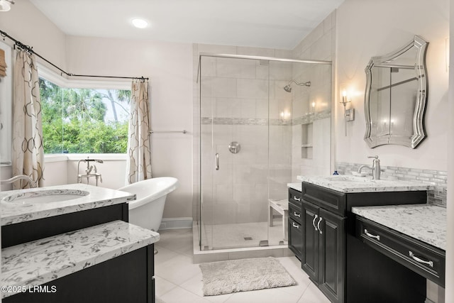 8 Wild Magnolia Ln, Okatie, SC 29909 - bathroom featuring a shower stall, a soaking tub, two vanities, and a sink
