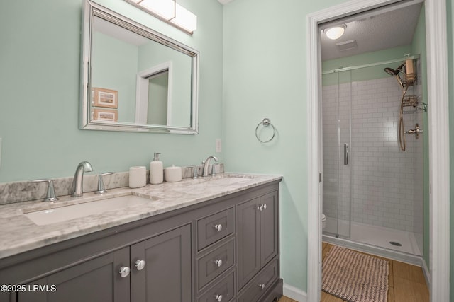 26 Fairway Club Dr, Fripp Island, SC 29920 - bathroom featuring a sink, a shower stall, and double vanity